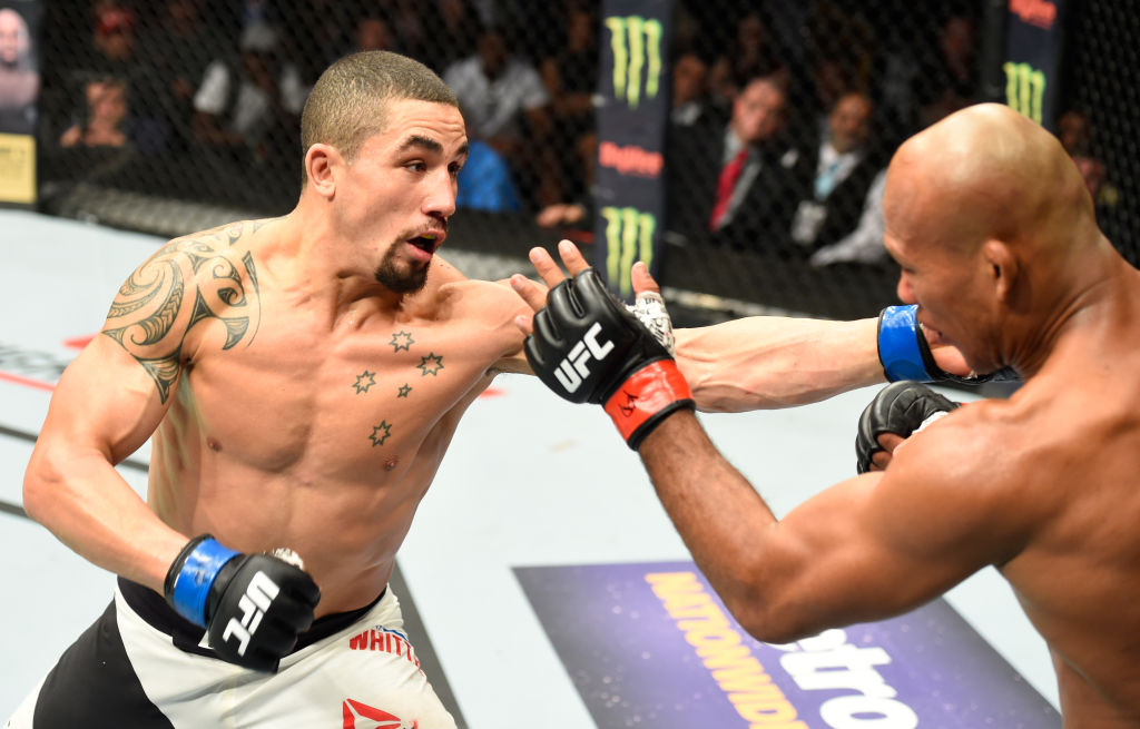 KANSAS CITY, MO - APRIL 15: (L-R) Robert Whittaker of New Zealand punches Jacare Souza of Brazil in their middleweight fight during the UFC Fight Night event at Sprint Center on April 15, 2017 in Kansas City, Missouri. (Photo by Josh Hedges/Zuffa LLC)