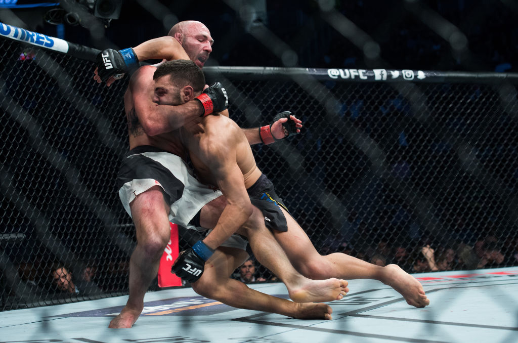 LAS VEGAS, NV - MARCH 04: (R-L) David Teymur of Sweden takes down Lando Vannata in their lightweight bout during the UFC 209 event at T-Mobile arena on March 4, 2017 in Las Vegas, Nevada. (Photo by Brandon Magnus/Zuffa LLC)