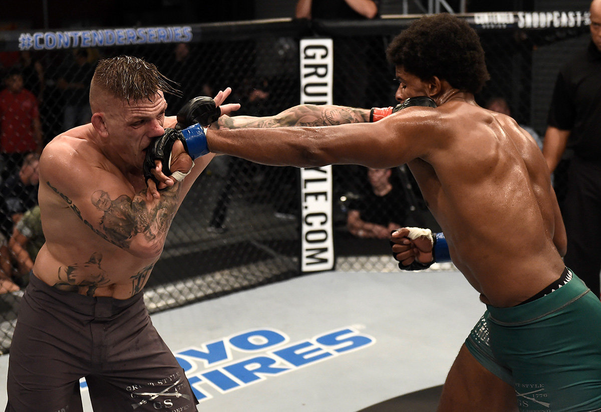 LAS VEGAS, NV - AUGUST 22: (R-L) Kennedy Nzechukwu and Anton Berzin of Ukraine trade punches in their light heavyweight bout during Dana White's Tuesday Night Contender Series at the TUF Gym on August 22, 2017 in Las Vegas, Nevada. (Photo by Brandon Magnus/DWTNCS)