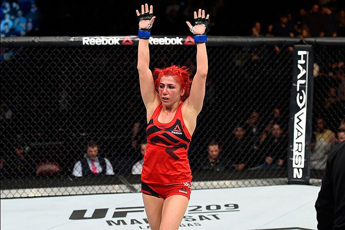 Randa Markos celebrates her victory over <a href='../fighter/Carla-Esparza'>Carla Esparza</a> at Fight Night Halifax“ align=“center“/><br />It’s safe to say that it’s gotten a little hot in Windsor, Ontario, Canada, this summer, and Markos is doing whatever it takes to push through those days when the most appealing option in the world is to quit.<p>“I keep telling myself it’s worth it, and hopefully Mexico City won’t be as bad.”</p><p>That’s fighter talk, and when that talk turns to action, like it has for Markos ever since she stepped on a wrestling mat as a kid, good things usually happen. It was certainly the case in February, when Markos defeated former strawweight world champion Carla Esparza.</p><p>The victory was huge for the 31-year-old on so many levels. It was over Esparza, who Markos had some heat with dating back to their time on <a href=