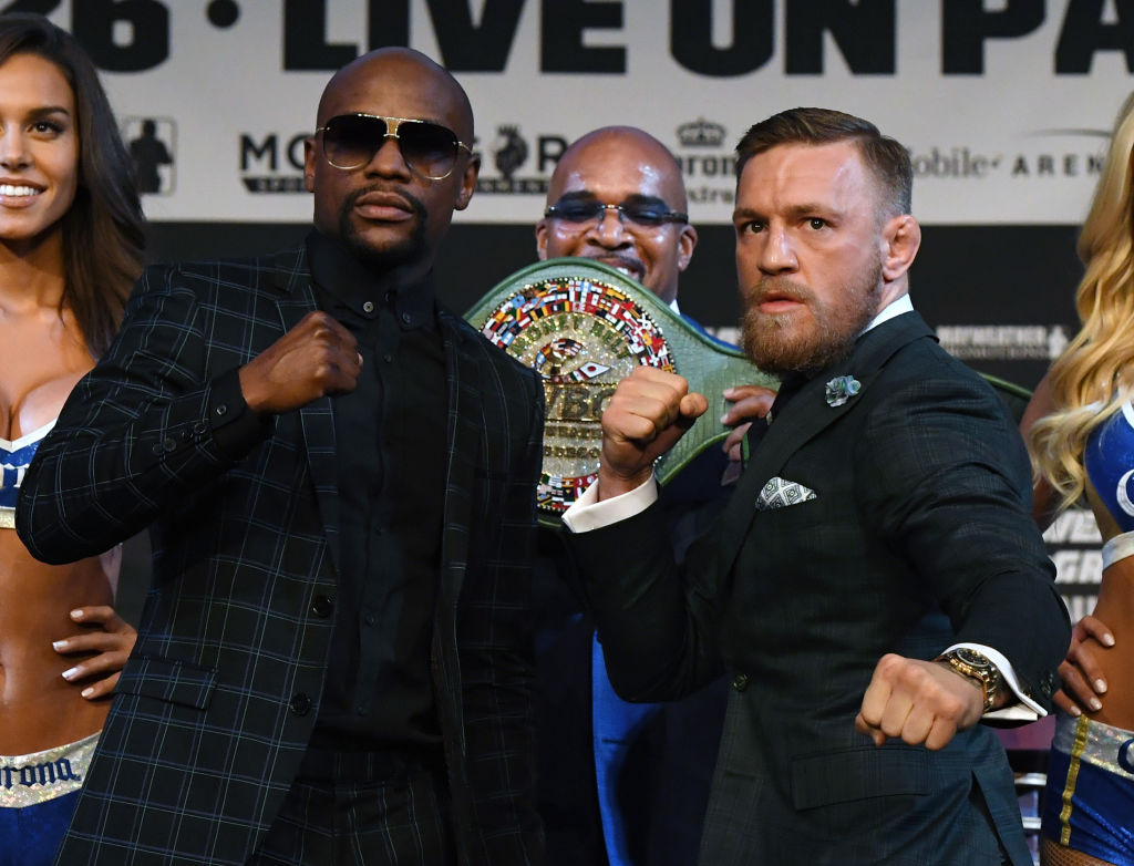 LAS VEGAS, NV - AUGUST 23: Boxer Floyd Mayweather Jr. (L) and UFC lightweight champion <a href='../fighter/Conor-McGregor'>Conor McGregor</a> (R) pose as Mayweather Promotions CEO Leonard Ellerbe (C) looks on during a news conference at the KA Theatre at MGM Grand Hotel & Casino on August 23, 2017 in Las Vegas, Nevada. Mayweather and McGregor will meet in a super welterweight boxing match at T-Mobile Arena on August 26 in Las Vegas. (Photo by Ethan Miller/Getty Images)“ align=“center“/>Leonard Ellerbe is normally a serious guy, at least when it comes to his friend Floyd Mayweather and his work as CEO of Mayweather Promotions. But during the three-country press tour to promote this Saturday’s bout between Mayweather and Conor McGregor, no one had a bigger smile on during each stop than he did.<p>“I’m very excited for a number of reasons,” Ellerbe said, admitting that this has been unlike any promotion he’s been a part of, and he’s been through all of them with Mayweather. “It’s a great time for our company, Mayweather Promotions, we’ve arrived and we’re definitely a top tier promotional company. It’s a great feeling to be promoting the biggest fight in combat sports history and we’re excited about what the future brings.”</p><p><strong><a href=