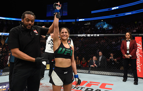 LAS VEGAS, NV - MARCH 04: Cynthia Calvillo reacts to her victory over <a href='../fighter/amanda-cooper'>Amanda Cooper</a> in their women’s strawweight bout during the UFC 209 event at T-Mobile Arena on March 4, 2017 in Las Vegas, Nevada. (Photo by Josh Hedges/Zuffa LLC)“ align=“left“/>The team recently added two more familiar names to its ranks as well, with <a href=