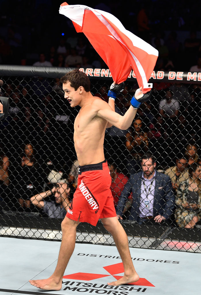 MEXICO CITY, MEXICO - AUGUST 05: Humberto Bandenay of Peru celebrates his knockout victory over Martin Bravo of Mexico in their lightweight bout during the UFC Fight Night event at Arena Ciudad de Mexico on August 5, 2017 in Mexico City, Mexico. (Photo by Jeff Bottari/Zuffa LLC)