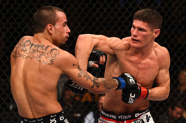 (R-L) Charles Rosa punches Sean Soriano in their featherweight fight during the UFC Fight Night event at the TD Garden on January 18, 2015 in Boston, MA. (Photo by Jeff Bottari/Zuffa LLC)