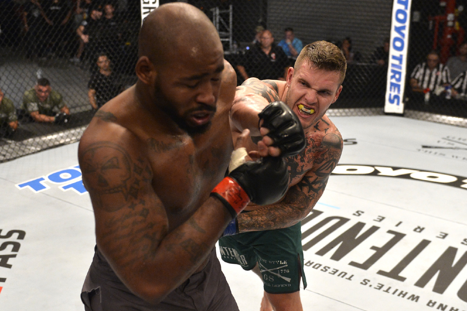 Allen Crowder punches Don'Tale Mayes during their fight on Dana White's Tuesday Night Contender Series.