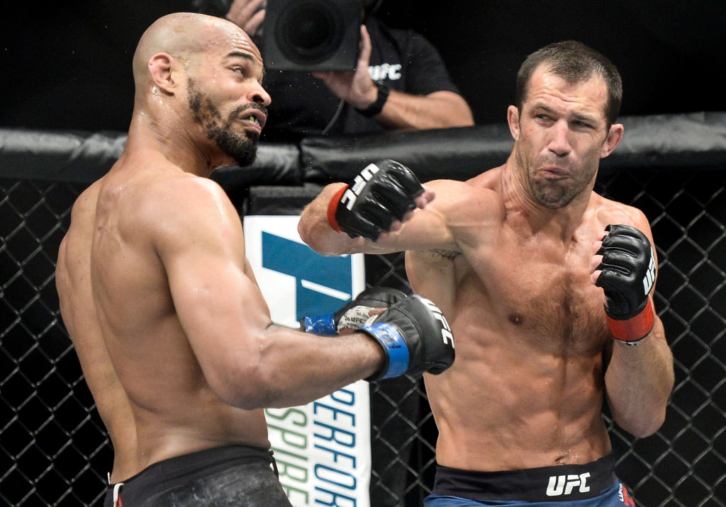 (R-L) Luke Rockhold punches David Branch in their middleweight bout during the UFC Fight Night event inside the PPG Paints Arena on September 16, 2017 in Pittsburgh, Pennsylvania. (Photo by Brandon Magnus/Zuffa LLC)