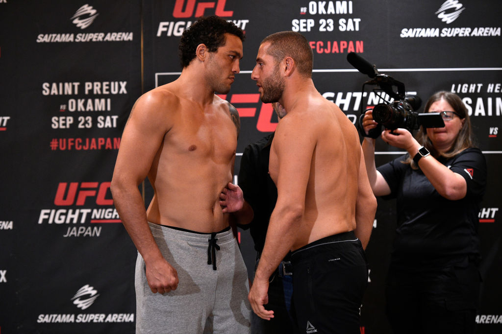 TOKYO, JAPAN - SEPTEMBER 21: (R-L) Opponents Henrique da Silva of Brazil and Gokhan Saki of Netherlands face off during the UFC Fight Night Weigh-in at the Hilton Tokyo on September 21, 2017 in Tokyo, Japan. (Photo by Jeff Bottari/Zuffa LLC)