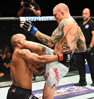 (R-L) Anthony Smith londs a knee against Hector Lombard of Cuba in their middleweight bout during the UFC Fight Night event inside the PPG Paints Arena on September 16, 2017 in Pittsburgh, Pennsylvania. (Photo by Josh Hedges/Zuffa LLC)