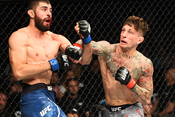 (L-R) Jason Gonzalez and Gregor Gillespie exchange punches in their lightweight bout during the UFC Fight Night event inside the PPG Paints Arena on September 16, 2017 in Pittsburgh, Pennsylvania. (Photo by Josh Hedges/Zuffa LLC)