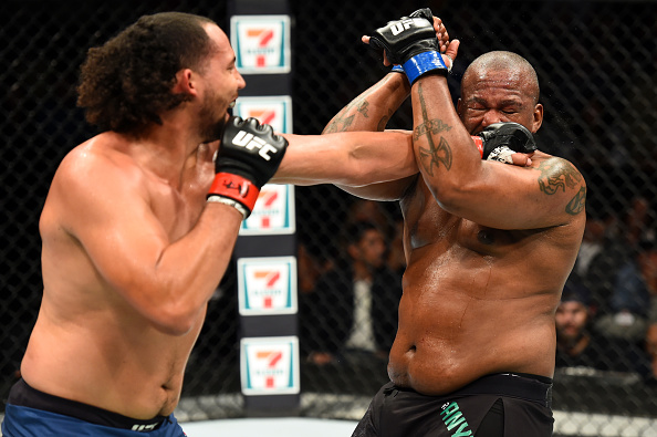 (L-R) Justin Ledet punches Zu Anyanwu in their heavyweight bout during the UFC Fight Night event inside the PPG Paints Arena on Sept. 16, 2017 in Pittsburgh, PA. (Photo by Josh Hedges/Zuffa LLC)