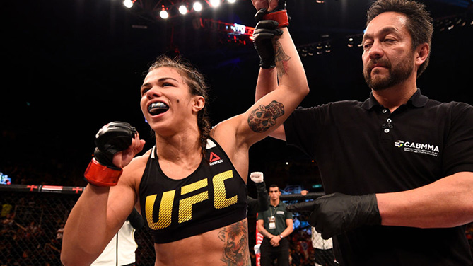 RIO DE JANEIRO, BRAZIL - JUNE 03: Claudia Gadelha of Brazil celebrates her submission victory over Karolina Kowalkiewicz of Poland in their womens strawweight bout during the UFC 212 event at Jeunesse Arena on June 3, 2017 in Rio de Janeiro, Brazil. (Photo by Jeff Bottari/Zuffa LLC/Zuffa LLC)