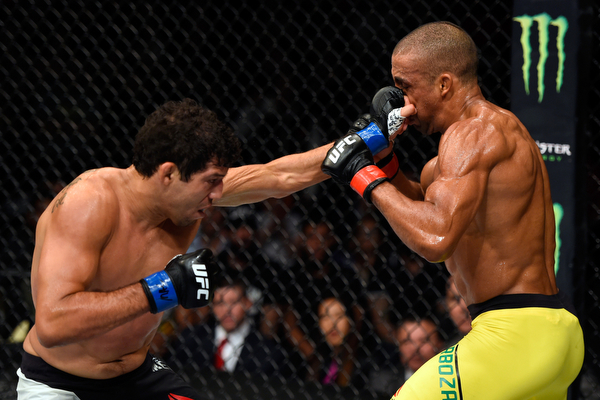 Melendez punches Edson Barboza during their lightweight bout