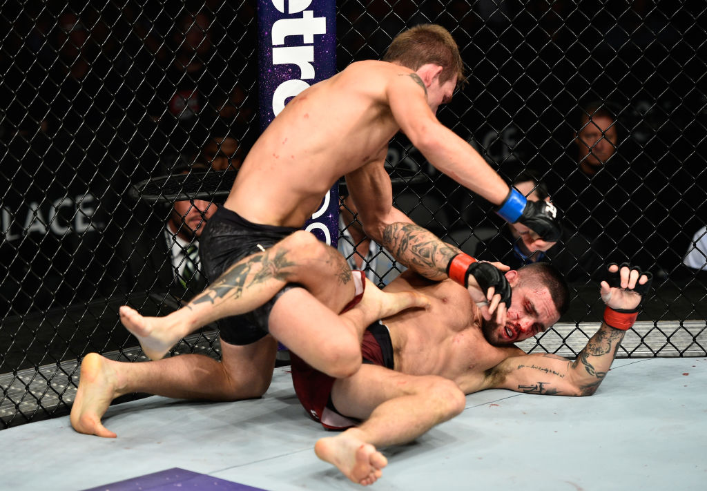 EDMONTON, AB - SEPTEMBER 09: <a href='../fighter/rick-glenn'>Rick Glenn</a> (top) punches <a href='../fighter/Gavin-Tucker'>Gavin Tucker</a> of Canada in their featherweight bout during the UFC 215 event inside the Rogers Place on September 9, 2017 in Edmonton, Alberta, Canada. (Photo by Jeff Bottari/Zuffa LLC)“ align=“center“/>Veteran featherweight Rick Glenn made it two straight in the Octagon, as he handed Gavin Tucker his first professional defeat via unanimous decision.</p><p>Looking better than ever after his first training camp with the Team Alpha Male squad in Sacramento, Glenn was a cardio machine as he pressed Tucker throughout and dominated in all aspects of the fight. In the third, Glenn took everything to another level, and he punished the gutsy Tucker throughout. Unfortunately, referee Kyle Cardinal opted not to step in, but the final result was never in doubt, as Glenn improved to 20-4-1 by scores of 30-25, 30-24 and 29-27. Nova Scotia’s Tucker falls 10-1.</p><p><strong>WHITE vs CLARKE</strong></p><blockquote class=