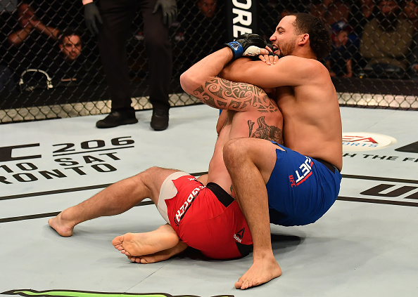 BELFAST, NORTHERN IRELAND: (R-L) <a href='../fighter/justin-ledet'>Justin Ledet</a> secures a rear choke submission against <a href='../fighter/mark-godbeer'>Mark Godbeer</a> of England in their heavyweight bout during the <a href='../event/UFC-Silva-vs-Irvin'>UFC Fight Night </a>at the SSE Arena on November 19, 2016 in Belfast, Northern Ireland. (Photo by Brandon Magnus/Zuffa LLC)“ align=“center“/>With Rotterdam and Edmonton in the rear view mirror, the focus shifts to Pittsburgh’s PPG Paints Arena, where 11 sets of competitors will cross the threshold into the Octagon in search of victory and a chance to move forward in their respective divisions on Saturday night.<p>Headlined by a contentious middleweight fight between former champ <a href=