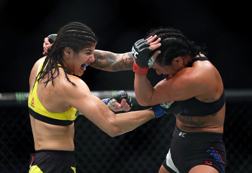 KANSAS CITY, MO - APRIL 15: <a href='../fighter/ketlen-vieira'>Ketlen Vieira</a> (l) battles <a href='../fighter/ashlee-evans-smith'>Ashlee Evans-Smith</a> (r) during their Women’s Bantamweight bout on <a href='../event/UFC-Silva-vs-Irvin'>UFC Fight Night </a>at the Sprint Center on April 15, 2017 in Kansas City, Missouri. (Photo by Jamie Squire/Getty Images)“ align=“center“/>This weekend, the sparkling new home of the NHL’s Edmonton Oilers plays host to the UFC Octagon, as 12 sets of competitors will make the walk inside Rogers Place as part of UFC 215.<p>Headlined by a pair of highly anticipated championship bouts, Saturday’s foray into the Great White North also features a pair of former lightweight standouts pursuing gold in different divisions with <a href=