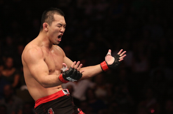 Yushin Okami reacts after defeating Buddy Roberts during their middleweight bout at UFC 150 inside Pepsi Center on August 11, 2012 in Denver, Colorado. (Photo by Nick Laham/Zuffa LLC)