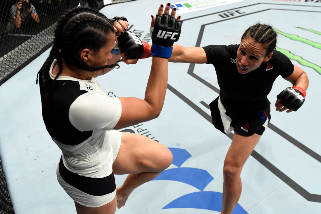 ROTTERDAM, NETHERLANDS - SEPTEMBER 02: (R-L) Marion Reneau punches Talita Bernardo of Brazil in their women's bantamweight bout during the UFC Fight Night event at the Rotterdam Ahoy on September 2, 2017 in Rotterdam, Netherlands. (Photo by Josh Hedges/Zuffa LLC)