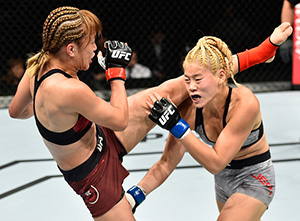 (L-R) Syuri Kondo kicks Chanmi Jeon of South Korea in their women's strawweight bout during the UFC Fight Night event inside the Saitama Super Arena on September 22, 2017 in Saitama, Japan. (Photo by Jeff Bottari/Zuffa LLC)