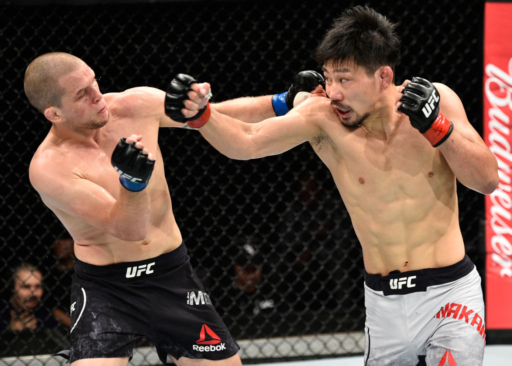 (R-L) Keita Nakamura of Japan punches Alex Morono in their welterweight bout during the UFC Fight Night event inside the Saitama Super Arena on September 22, 2017 in Saitama, Japan. (Photo by Jeff Bottari/Zuffa LLC)