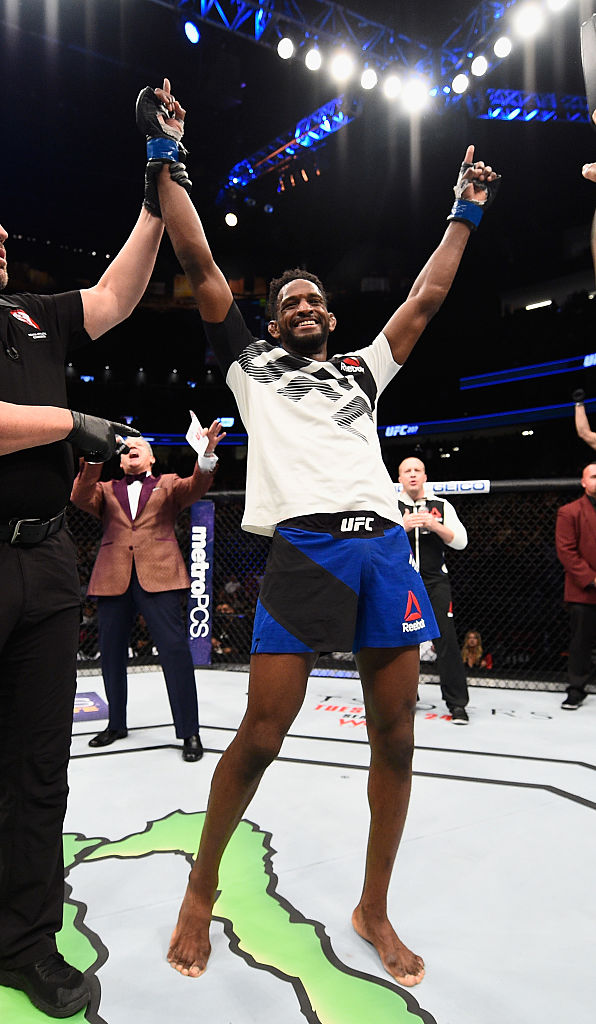 LAS VEGAS, NV - DECEMBER 30: Neil Magny (left) reacts to his victory over Johny Hendricks in their welterweight bout during the UFC 207 event at T-Mobile Arena on December 30, 2016 in Las Vegas, Nevada. (Photo by Jeff Bottari/Zuffa LLC)
