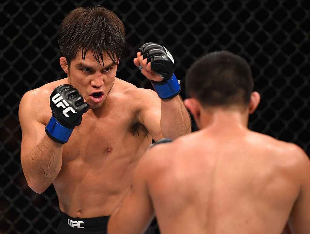 MONTERREY, MEXICO - NOVEMBER 21: (L-R) Henry Cejudo of the United States battles Jussier Formiga of Brazil in their flyweight bout during the UFC Fight Night event at Arena Monterrey on November 21, 2015 in Monterrey, Mexico. (Photo by Jeff Bottari/Zuffa LLC)