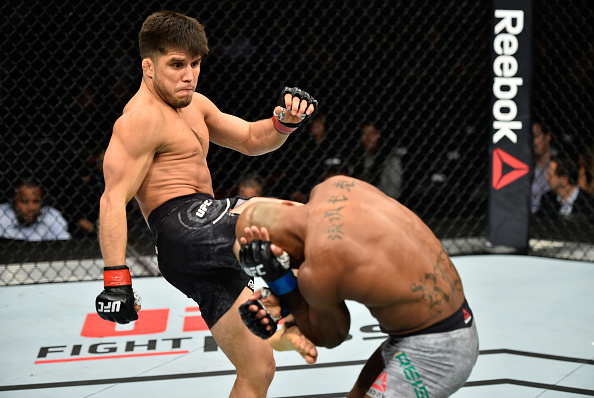 EDMONTON, AB - SEPTEMBER 09: (L-R) Henry Cejudo kicks Wilson Reis of Brazil in their flyweight bout during the UFC 215 event inside the Rogers Place on September 9, 2017 in Edmonton, Alberta, Canada. (Photo by Jeff Bottari/Zuffa LLC/Zuffa LLC via Getty Images)