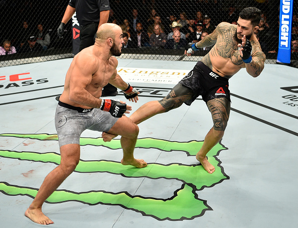 EDMONTON, AB - SEPTEMBER 09: (R-L) Tyson Pedro of Australia kicks Ilir Latifi of Sweden in their light heavyweight bout during the UFC 215 event inside the Rogers Place on September 9, 2017 in Edmonton, Alberta, Canada. (Photo by Jeff Bottari/Zuffa LLC/Zuffa LLC via Getty Images)