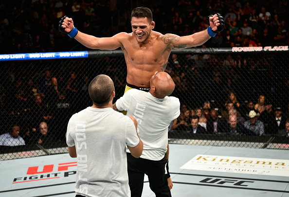 EDMONTON, AB - SEPTEMBER 09: <a href='../fighter/Rafael-Dos-Anjos'>Rafael Dos Anjos</a> of Brazil celebrates his submission victory over <a href='../fighter/Neil-Magny'>Neil Magny</a> in their welterweight bout during the UFC 215 event inside the Rogers Place on September 9, 2017 in Edmonton, Alberta, Canada. (Photo by Jeff Bottari/Zuffa LLC)“ align=“left“/>When <a href=