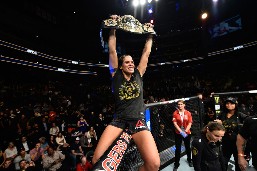 EDMONTON, AB - SEPTEMBER 09: <a href='../fighter/Amanda-Nunes'>Amanda Nunes</a> of Brazil celebrates her victory over <a href='../fighter/Valentina-Shevchenko'>Valentina Shevchenko</a> of Kyrgyzstan in their women’s bantamweight bout during the UFC 215 event inside the Rogers Place on September 9, 2017 in Edmonton, Alberta, Canada. (Photo by Jeff Bottari/Zuffa LLC)“/>EDMONTON – The highest-level women’s MMA fight in history, as most were calling it, played out as such when both Amanda Nunes and Valentina Shevchenko played the <a href=