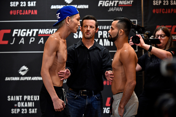 (R-L) Opponents Jussier Formiga of Brazil and Ulka Sasaki of Japan face off during the UFC Fight Night Weigh-in at the Hilton Tokyo on September 21, 2017 in Tokyo, Japan. (Photo by Jeff Bottari/Zuffa LLC)