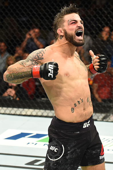  <a href='../fighter/mike-perry'>Mike Perry</a> celebrates after defeating <a href='../fighter/alex-reyes'>Alex Reyes</a> in their welterweight bout during the UFC Fight Night event inside the PPG Paints Arena on September 16, 2017 in Pittsburgh, Pennsylvania. (Photo by Josh Hedges/Zuffa LLC)“ align=“right“/> Rockhold definitely got everything he could handle early, as Branch came out head hunting and looking for the early knockout. It appeared that Branch may have rattled Rockhold during one furious combination he unleashed in the opening round, but the California native survived and only got stronger as time ticked away on the clock.</p><p>In the second round, Rockhold threw Branch to the ground with a body lock before moving into mount, where he began raining down punches from the top in rapid fire succession. Branch had no exit and eventually tapped out from the strikes as Rockhold earned the submission victory in his first fight in more than 15 months.</p><p>Rockhold was definitely a heavy favorite in the main event according to fantasy players, with an overwhelming 88 percent picking him to win against Branch. Strangely enough, Rockhold was picked by 63 percent to finish the fight by knockout, but because Branch actually tapped out, the win is recorded as a submission.</p><p>In the co-main event, Mike Perry racked up another highlight reel finish as he put away late notice replacement Alex Reyes with a vicious knee strike that flattened the UFC newcomer. Of course, Perry was a lopsided favorite going into the fight after Reyes accepted the matchup on just a few days’ notice after <a href=