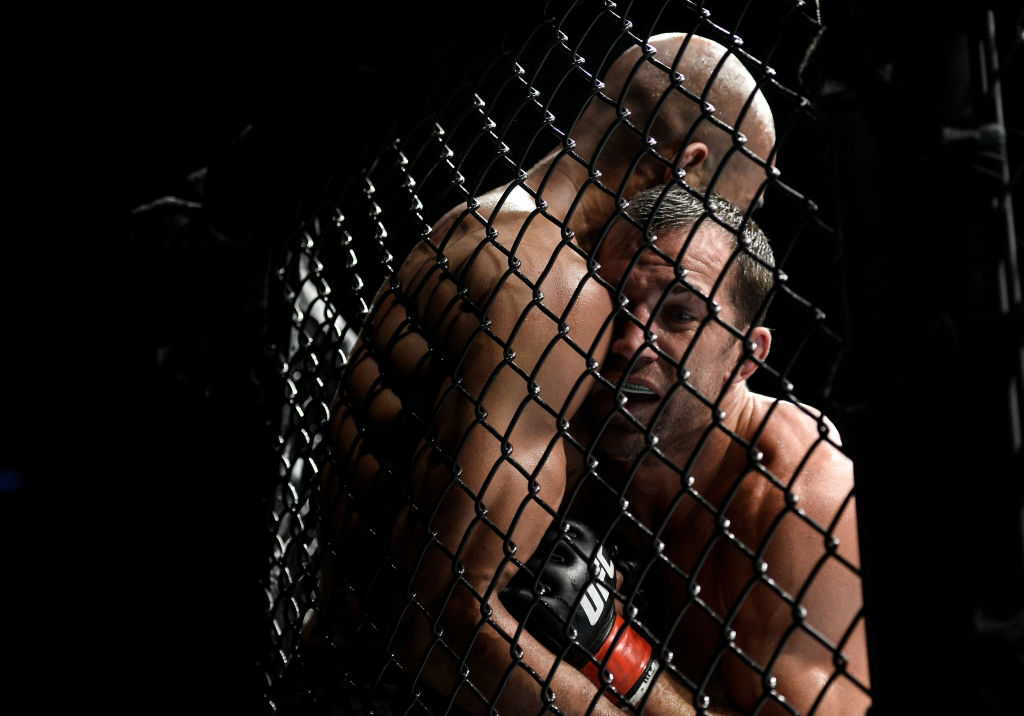  (R-L) <a href='../fighter/Luke-Rockhold'>Luke Rockhold</a> pushes <a href='../fighter/Dave-Branch'>David Branch</a> up against the cage in their middleweight bout during the <a href='../event/UFC-Silva-vs-Irvin'>UFC Fight Night </a>event inside the PPG Paints Arena on September 16, 2017 in Pittsburgh, Pennsylvania. (Photo by Brandon Magnus/Zuffa LLC)“/>It was a long road back to the Octagon for former middleweight champion Luke Rockhold, but he made the most of his return to action after putting away David Branch in the second round in their main event fight in Pittsburgh on Saturday night.</p><p><img class=