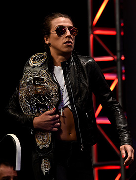 UFC strawweight champion Joanna Jedrzejczyk of Poland walks onto the stage during the UFC 217 news conference inside T-Mobile Arena on October 6, 2017 in Las Vegas, Nevada. (Photo by Brandon Magnus/Zuffa LLC)