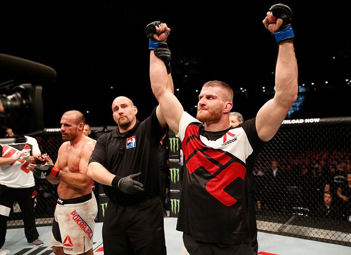 Jan Blachowicz celebrates his victory over <a href='../fighter/Igor-Pokrajac'>Igor Pokrajac</a> from their bout in April of 2016″ align=“center“/><br /><strong>Jan Blachowicz vs. Devin Clark</strong><p>Coming off two straight wins in the light heavyweight division, Devin Clark has looked like the kind of fighter who could one day knock on the door of the top 15 rankings, but he’ll face a true veteran this weekend in Jan Blachowicz. Clark walks into the fight as the favorite, but don’t underestimate Blachowicz’s ability to pull off the upset after facing the best of the best that the light heavyweight division has to offer.</p><p>Blachowicz is a crafty veteran with a strong striking attack and a slick ground game as well. Blachowicz lands with good volume as well as outstanding accuracy, where he’s hitting his target 50 percent of the time. Blachowicz will also mix in a takedown when necessary, and he’s shown strong wrestling throughout his time in the UFC as well.</p><p>Now Clark definitely likes to throw power with his hands and show off a good wrestling attack. Clark averages just over two and a half takedowns per fight, so Blachowicz has to be wary not to get too aggressive on the feet or he might find himself planted on his back for three rounds. That said, Blachowicz has a ton of experience on his side and as long as he fights smart, he should be able to pull off the win.</p><p>Blachowicz isn’t the biggest knockout puncher at 205 pounds, but he’s got good power in his hands and he can mount a lot of damage over three rounds. Blachowicz has only lost to top 10 competition since arriving in the UFC while giving all those opponents everything they could handle. In fact, Blachowicz hasn’t been finished by any fighter in the UFC and that’s while taking on names such as <a href=