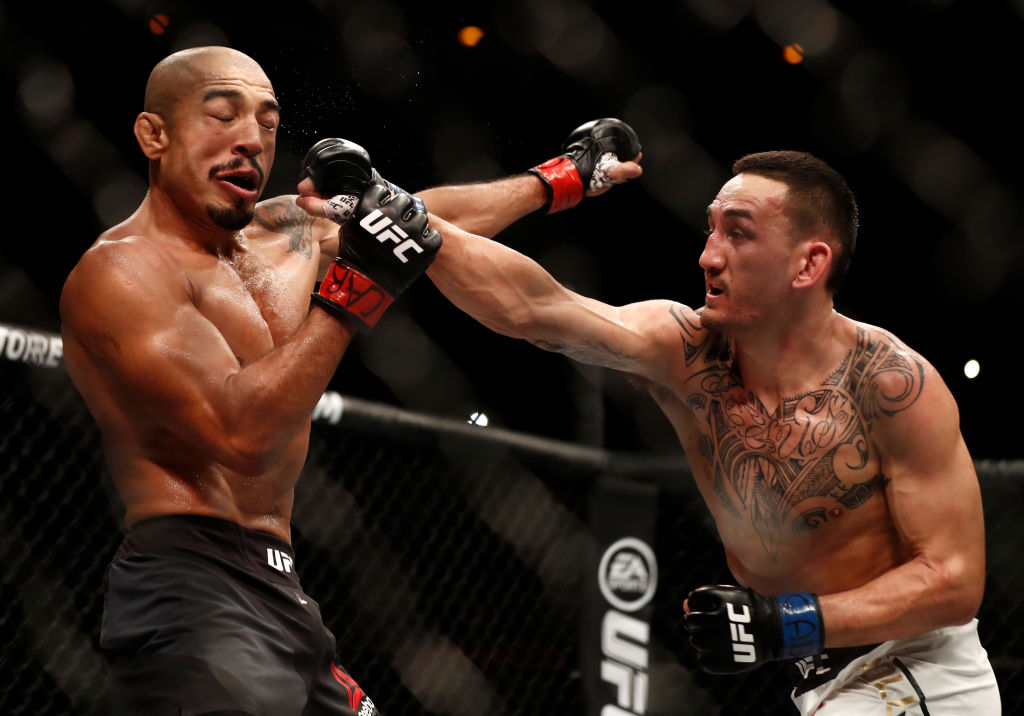 (R-L) Max Holloway punches Jose Aldo of Brazil in their UFC featherweight championship bout during the UFC 212 event at Jeunesse Arena on June 3, 2017 in Rio de Janeiro, Brazil. (Photo by Buda Mendes/Zuffa LLC)