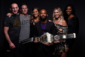 UFC flyweight champion Demetrious Johnson poses for a portrait backstage with his family and team after his victory over Ray Borg during the UFC 216 event inside TMobile Arena on October 7, 2017 in Las Vegas, Nevada. (Photo by Mike Roach/Zuffa LLC)