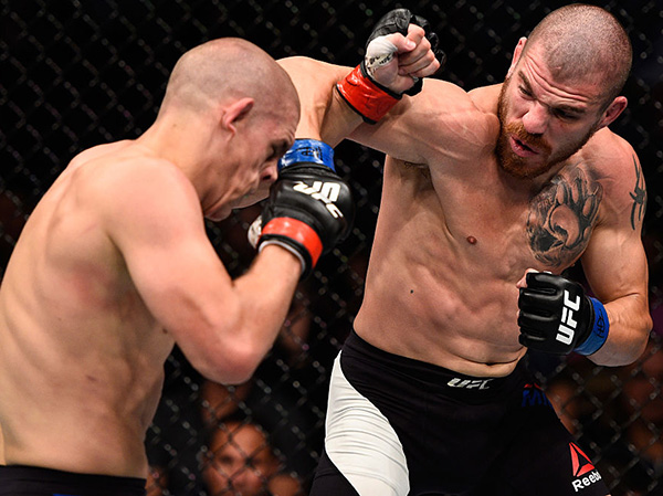 (R-L) <a href='../fighter/Jim-Miller'>Jim Miller</a> of the United States punches <a href='../fighter/Joe-Lauzon'>Joe Lauzon</a> of the United States in their lightweight bout during the <a href='../event/UFC-Silva-vs-Irvin'>UFC Fight Night </a>event at Rogers Arena on August 27, 2016 in Vancouver, British Columbia, Canada. (Photo by Jeff Bottari/Zuffa LLC)“ align=“center“/><br />All the UFC needed to tell Jim Miller was that his next fight against <a href=