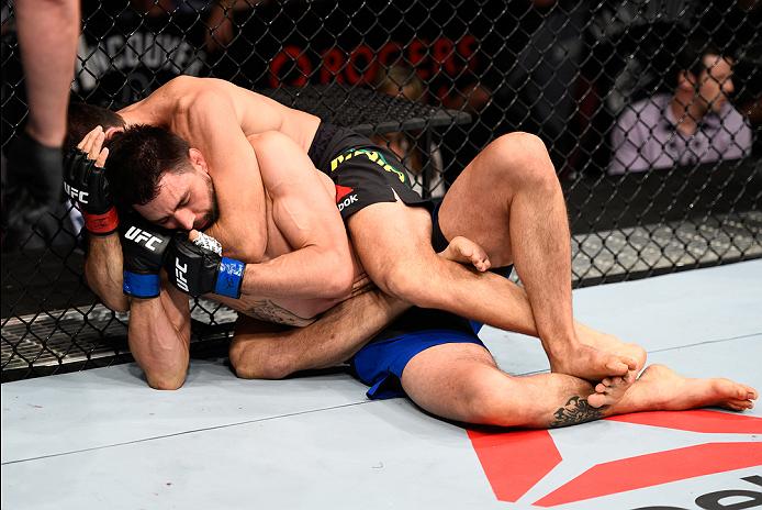 Demian Maia attempts to submit <a href='../fighter/Carlos-Condit'>Carlos Condit</a> during their welterweight bout in August of 2016″ align=“center“/><p><strong>August 2016 – Carlos Condit (<a href=