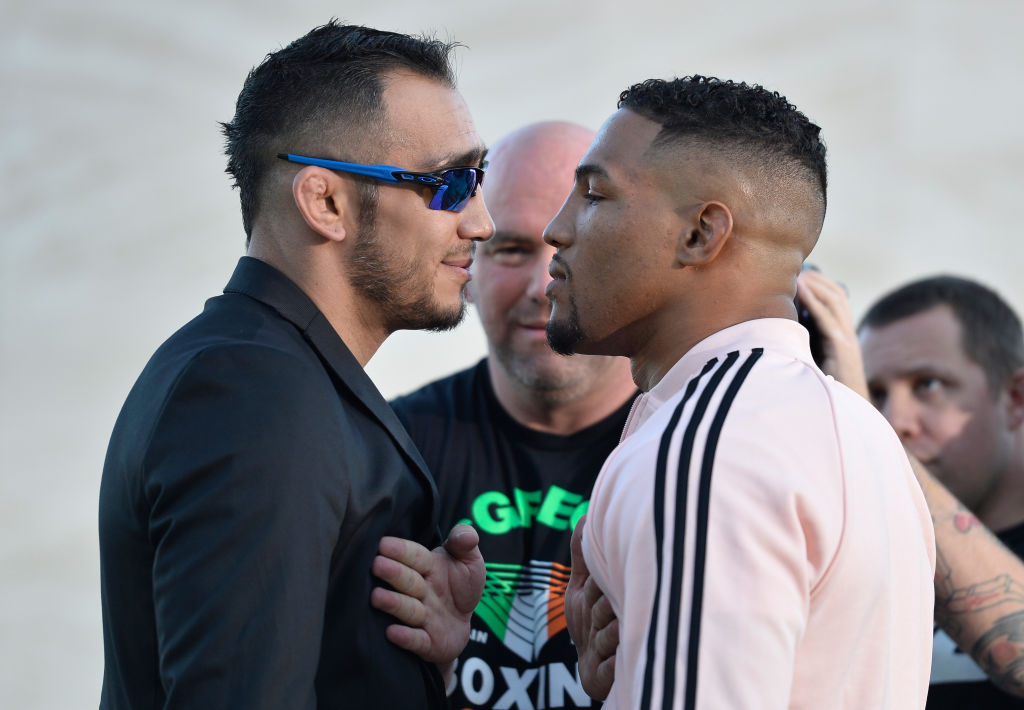 <a href='../fighter/Walt-Harris'>Walt Harris</a> celebrates after his TKO victory over <a href='../fighter/cyril-asker'>Cyril Asker</a> of France in their heavyweight bout during the <a href='../event/UFC-Silva-vs-Irvin'>UFC Fight Night </a>event at the Singapore Indoor Stadium on June 17, 2017 in Singapore. (Photo by Brandon Magnus/Zuffa LLC)“ align=“left“/>On one side stands Tony Ferguson, who has won nine fights in a row while carving his way through the lightweight rankings. On the other is Kevin Lee, an upstart contender who has looked unstoppable during a run that includes a first-round submission win over former <a href=