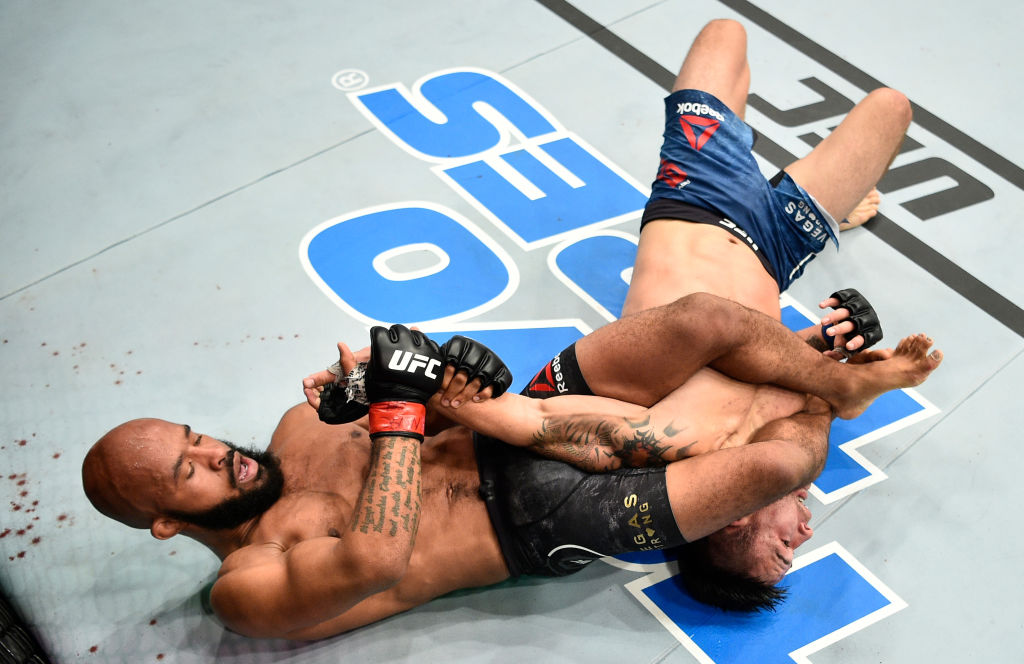 LAS VEGAS, NV - OCTOBER 07: Demetrious Johnson secures an arm bar submission against Ray Borg in their UFC flyweight championship bout during the UFC 216 event inside T-Mobile Arena on October 7, 2017 in Las Vegas, Nevada. (Photo by Jeff Bottari/Zuffa LLC)