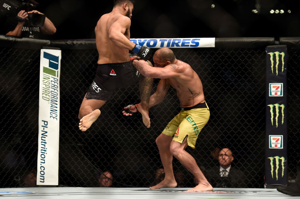 LAS VEGAS, NV - OCTOBER 07: (L-R) Brad Tavares lands a flying knee against Thales Leites of Brazil in their middleweight bout during the UFC 216 event inside T-Mobile Arena on October 7, 2017 in Las Vegas, Nevada. (Photo by Brandon Magnus/Zuffa LLC)