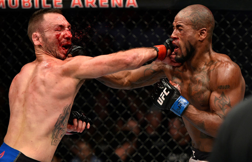 Lando Vannata and Bobby Green exchange punches during their fight at UFC 216