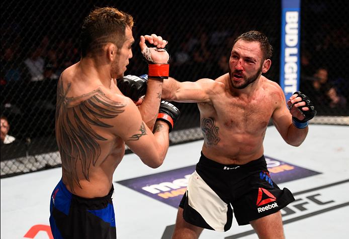 Lando Vannata punches Tony Ferguson during their lightweight bout at Fight Night Sioux Falls