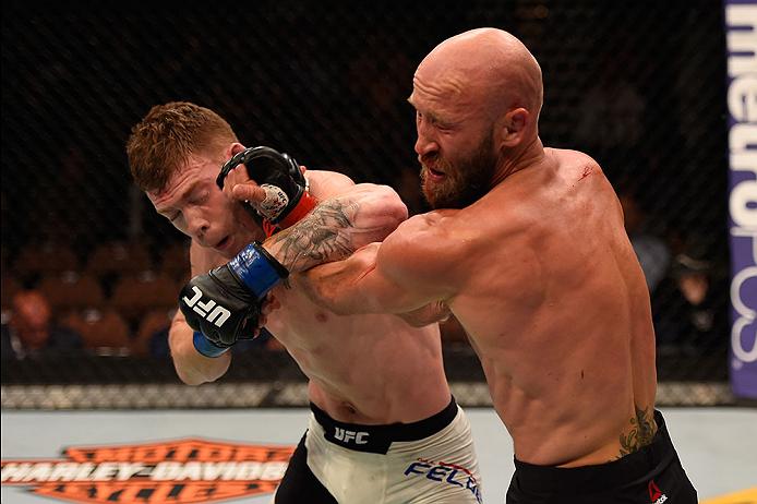 Paul Felder punches <a href='../fighter/Josh-Burkman'>Joshua Burkman</a> during their lightweight bout in May of 2016″ align=“right“/> to putting the gloves back on this weekend; like really looking forward to getting into the Octagon and building on his pair of 2017 knockouts over Alessandro Ricci and <a href=