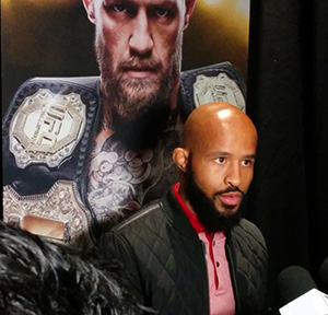 Demetrious Johnson answers questions from the media following the launch of EA Sports UFC 3 on Nov. 2, 2017 at Madison Square Garden in NY, NY. Photo by Steve Latrell.