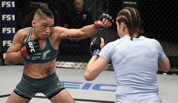 Sijara Eubanks punches Roxanne Modafferi during their semifinal fight in The Ultimate Fighter