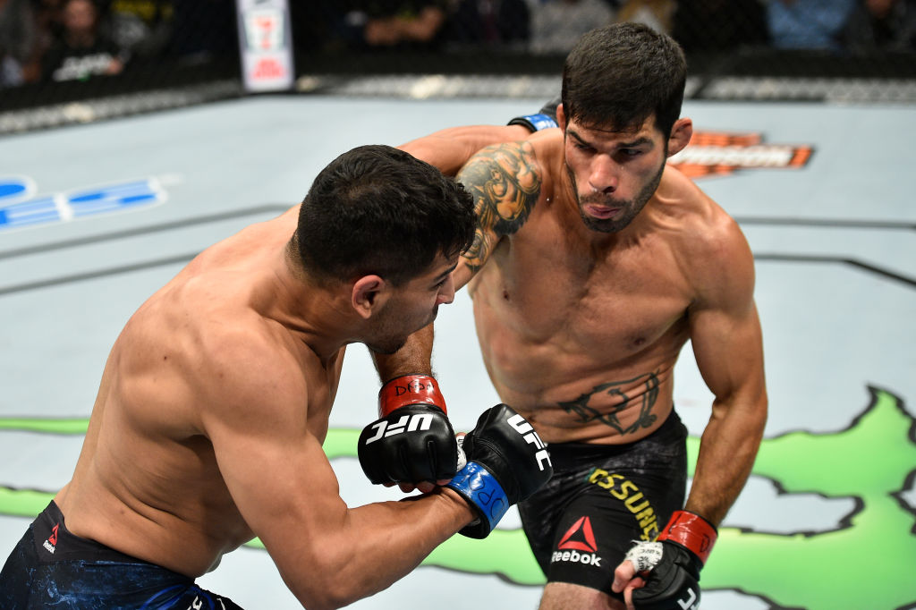 NORFOLK, VA - NOVEMBER 11: (R-L) Raphael Assuncao of Brazil punches Matthew Lopez in their bantamweight bout during the UFC Fight Night event inside the Ted Constant Convention Center on November 11, 2017 in Norfolk, Virginia. (Photo by Brandon Magnus/Zuffa LLC)