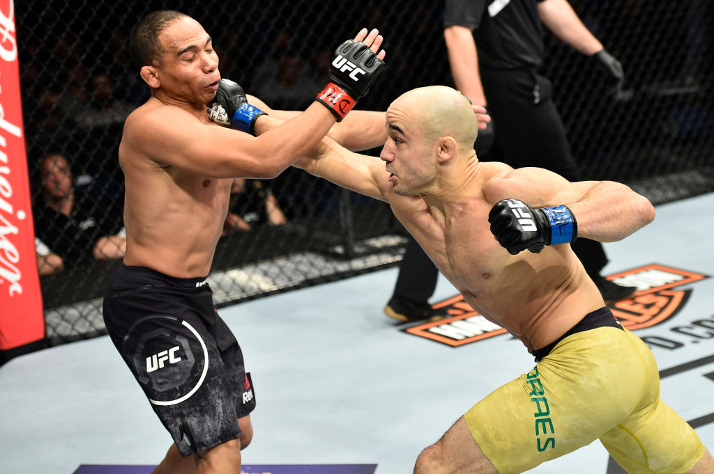 NORFOLK, VA - NOVEMBER 11: (R-L) Marlon Moraes of Brazil punches John Dodson in their bantamweight bout during the UFC Fight Night event inside the Ted Constant Convention Center on November 11, 2017 in Norfolk, Virginia. (Photo by Brandon Magnus/Zuffa LLC)