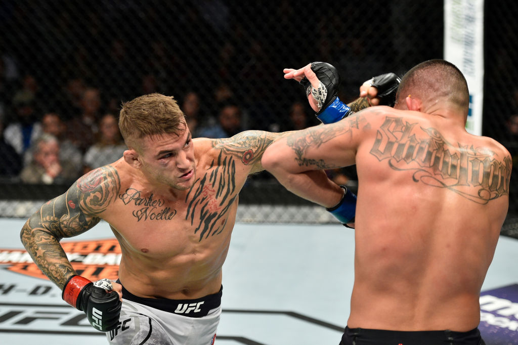 NORFOLK, VA - NOVEMBER 11: (L-R) Dustin Poirier punches Anthony Pettis in their lightweight bout during the UFC Fight Night event inside the Ted Constant Convention Center on November 11, 2017 in Norfolk, Virginia. (Photo by Brandon Magnus/Zuffa LLC)