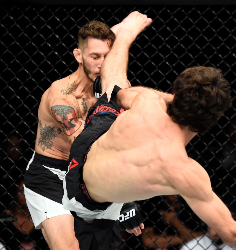 ROTTERDAM, NETHERLANDS - SEPTEMBER 02: (R-L) Zabit Magomedsharipov of Russia lands a kick to the head of Mike Santiago in their featherweight bout during the UFC Fight Night event at the Rotterdam Ahoy on September 2, 2017 in Rotterdam, Netherlands. (Photo by Josh Hedges/Zuffa LLC)